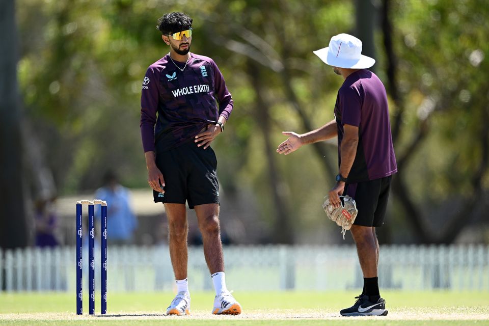 Shoaib Bashir in discussion with Jeetan Patel