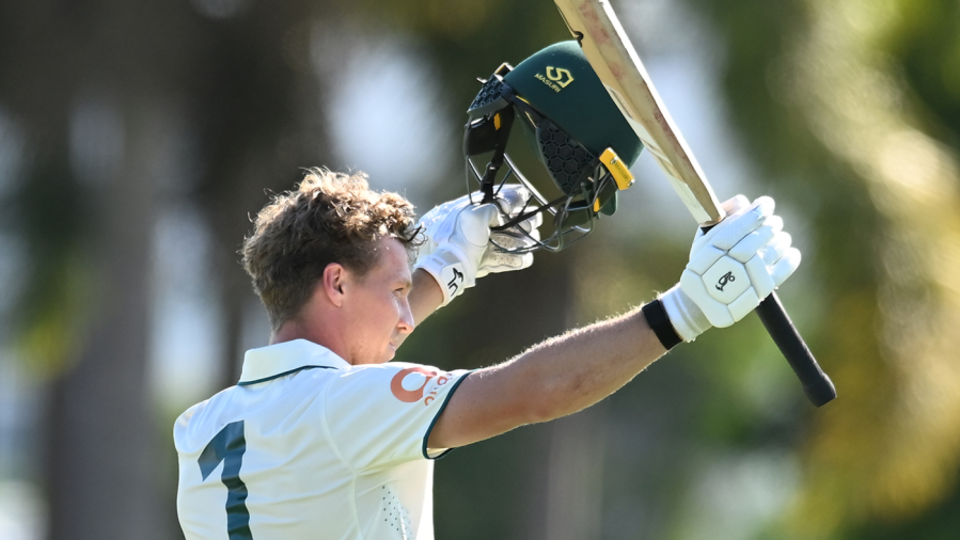 Nathan McSweeney celebrates his double century