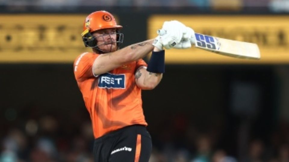 Finn Allen swings the ball away