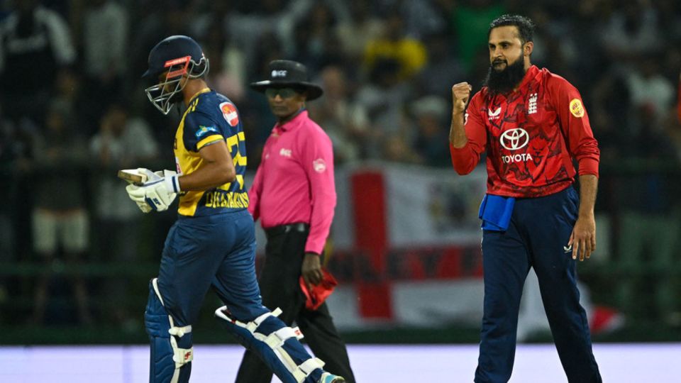 Adil Rashid celebrates after taking the wicket of Dhananjaya de Silva