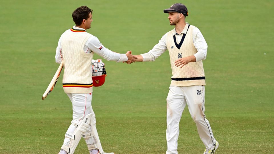 See you next week: Alex Carey and Peter Handscomb shake hands