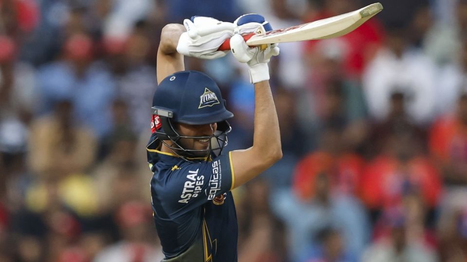Shubman Gill holds the pose after playing a drive