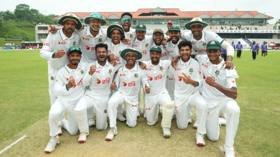 The Bangladesh players celebrate their win
