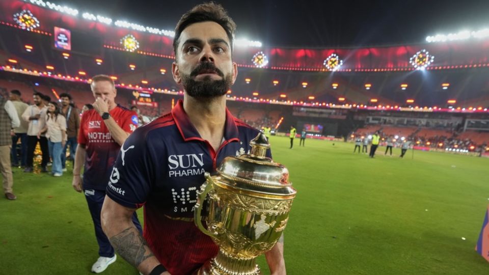 Virat Kohli with the IPL trophy