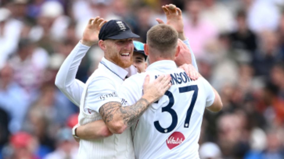 Gus Atkinson celebrates with Ben Stokes