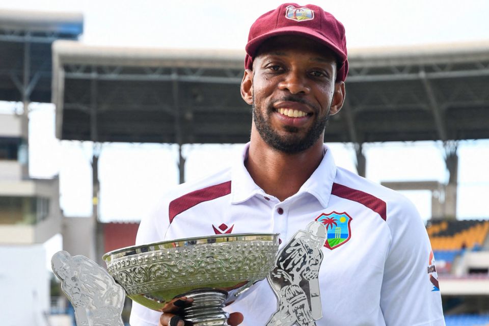 Roston Chase with the Sobers-Tissera Trophy