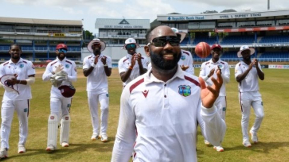Jomel Warrican leads the team off after picking up a six-for