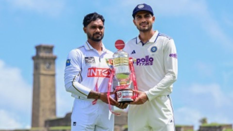 Dhananjaya de Silva and Shubman Gill pose with the series trophy
