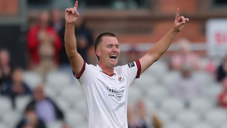 Ben Walkden celebrates his maiden first-class wicket