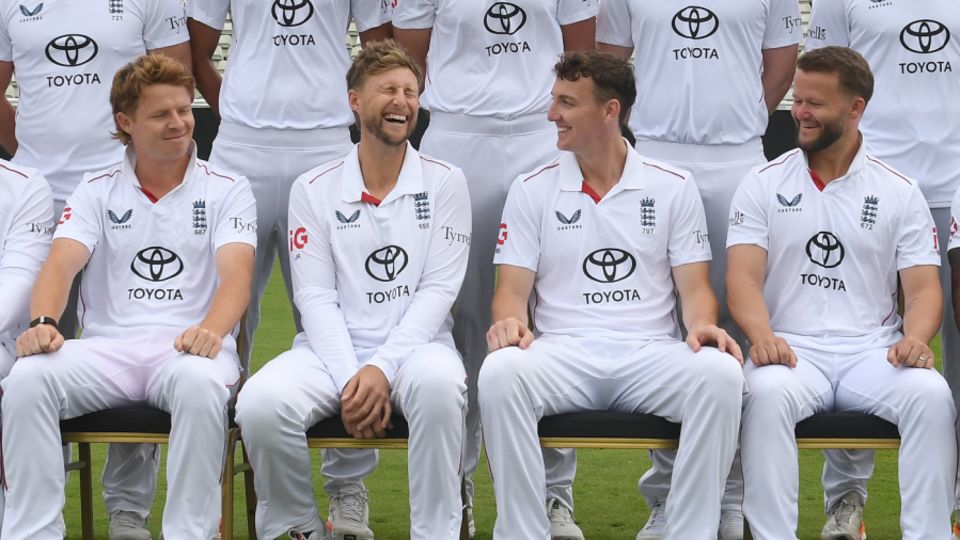 Joe Root shares a joke with his England team-mates during their photocall