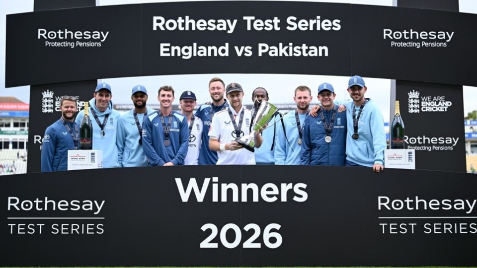 Joe Root holds up the series trophy