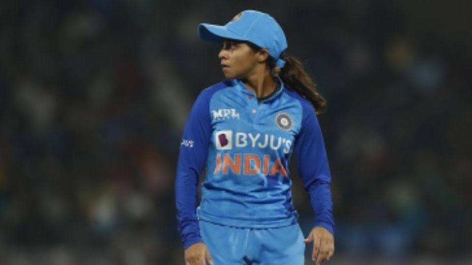 Devika Vaidya looks on in the field