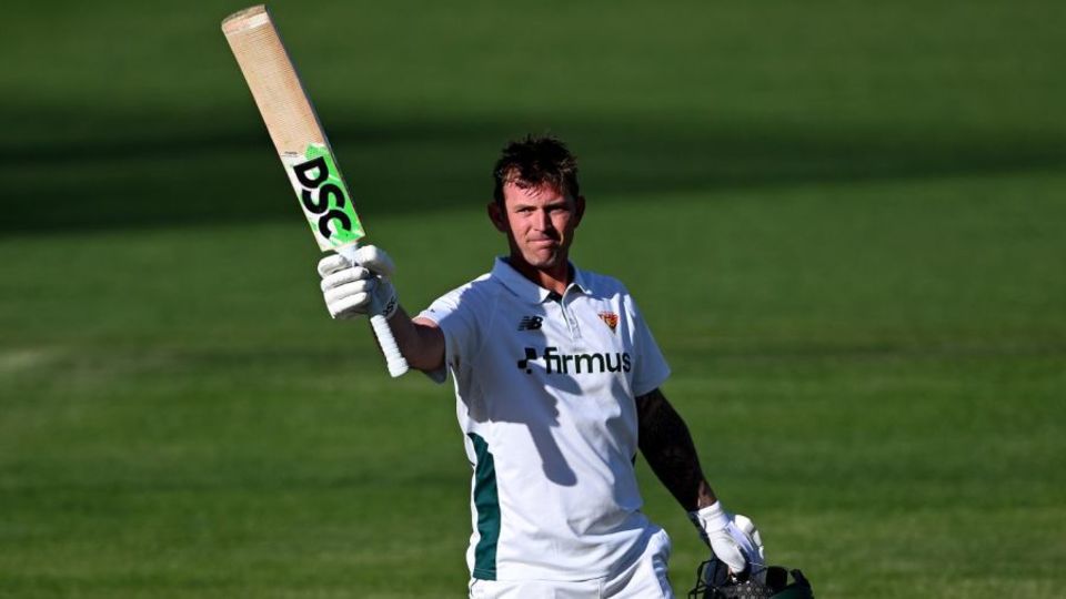 Ben McDermott celebrates his century