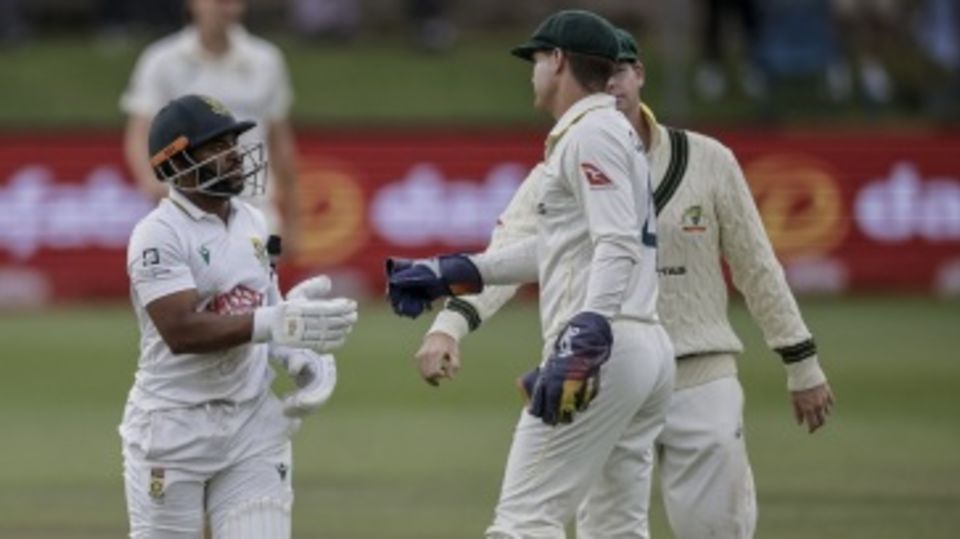 Alex Carey and Steven Smith shake hands with Temba Bavuma after his 179