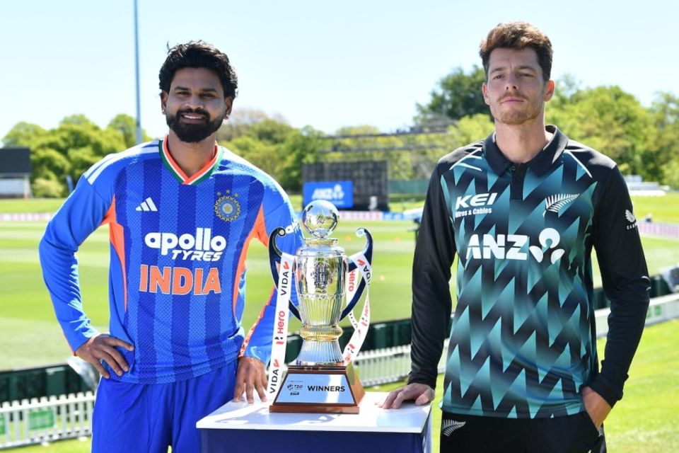 Shreyas Iyer and Mitchell Santner pose with the series trophy