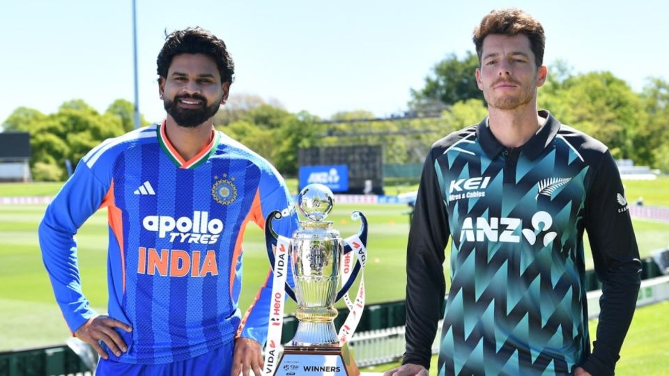 Shreyas Iyer and Mitchell Santner pose with the series trophy