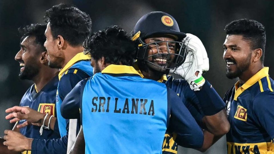 Janith Liyanage celebrates with team-mates after hitting six to win the game off the penultimate ball