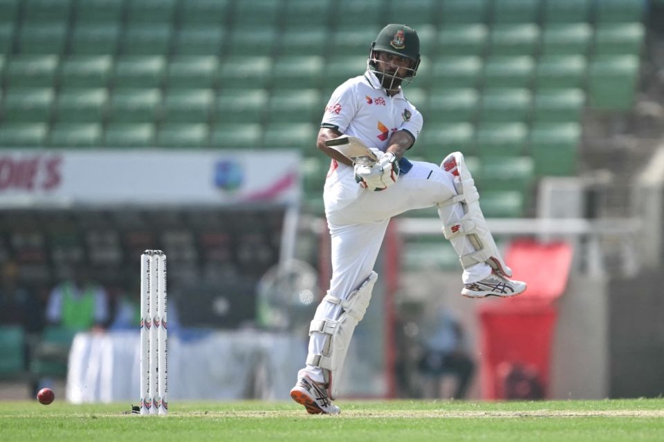 Shadman Islam turns the ball away