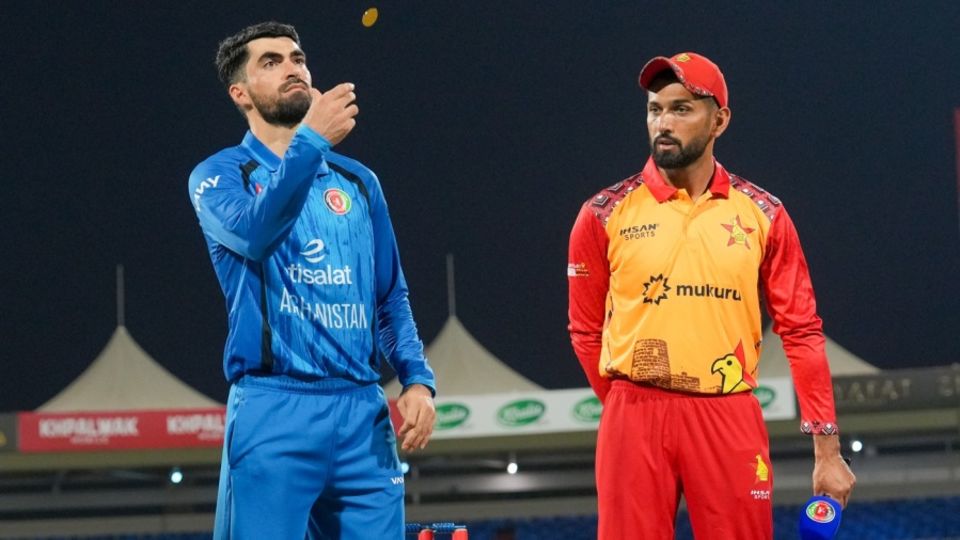 Ibrahim Zadran and Sikandar Raza at the toss
