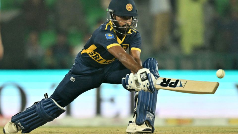 Pavan Rathnayake sweeps during his century