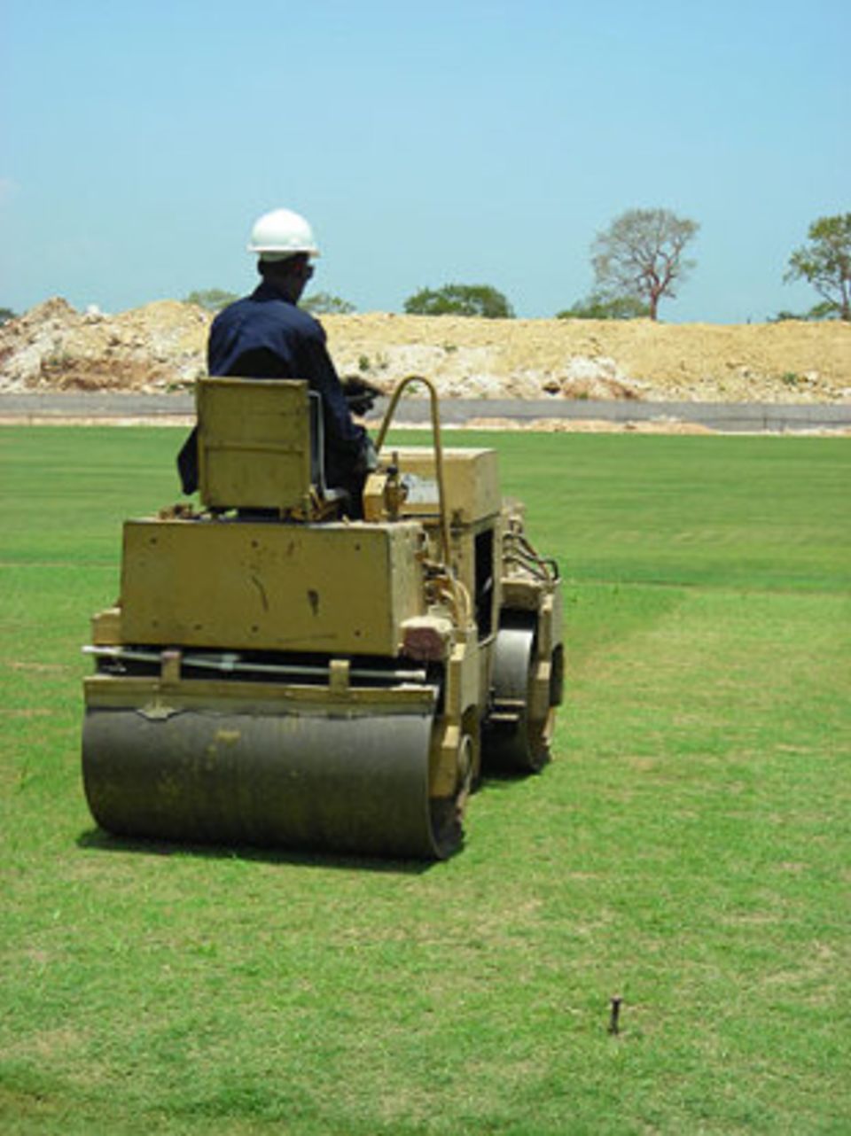 The Trelawny pitch is rolled for the first time, as Jamaica steps up preparations for the World Cup