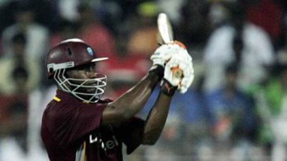 Marlon Samuels swivels and fetches a boundary