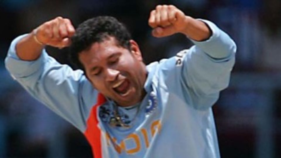 Sachin Tendulkar celebrates the wicket of Upul Tharanga