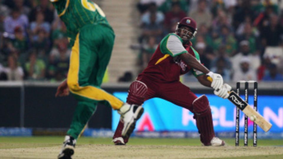 Chris Gayle gives himself room to play a shot