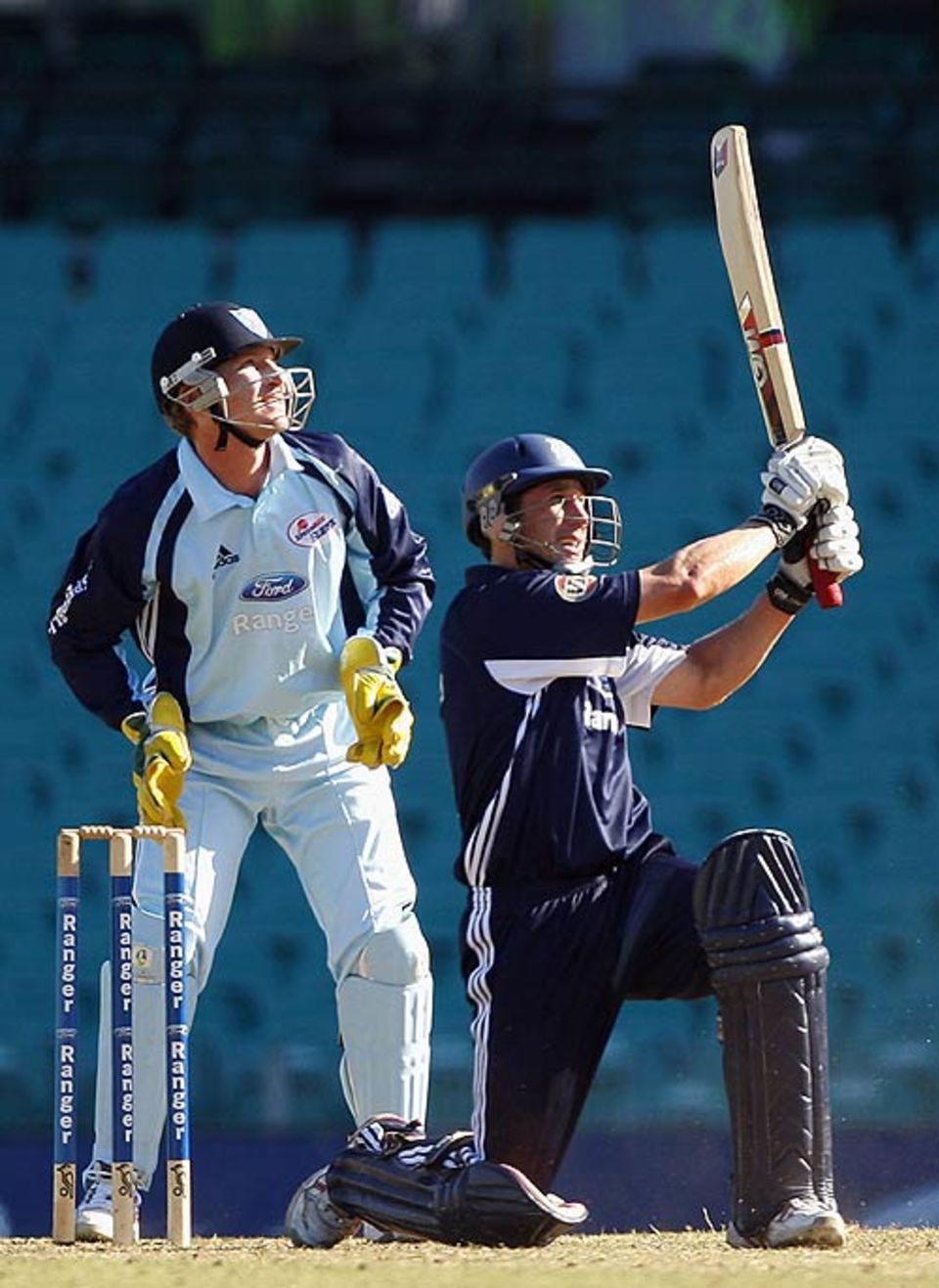 David Hussey launches another six during his 60-ball century