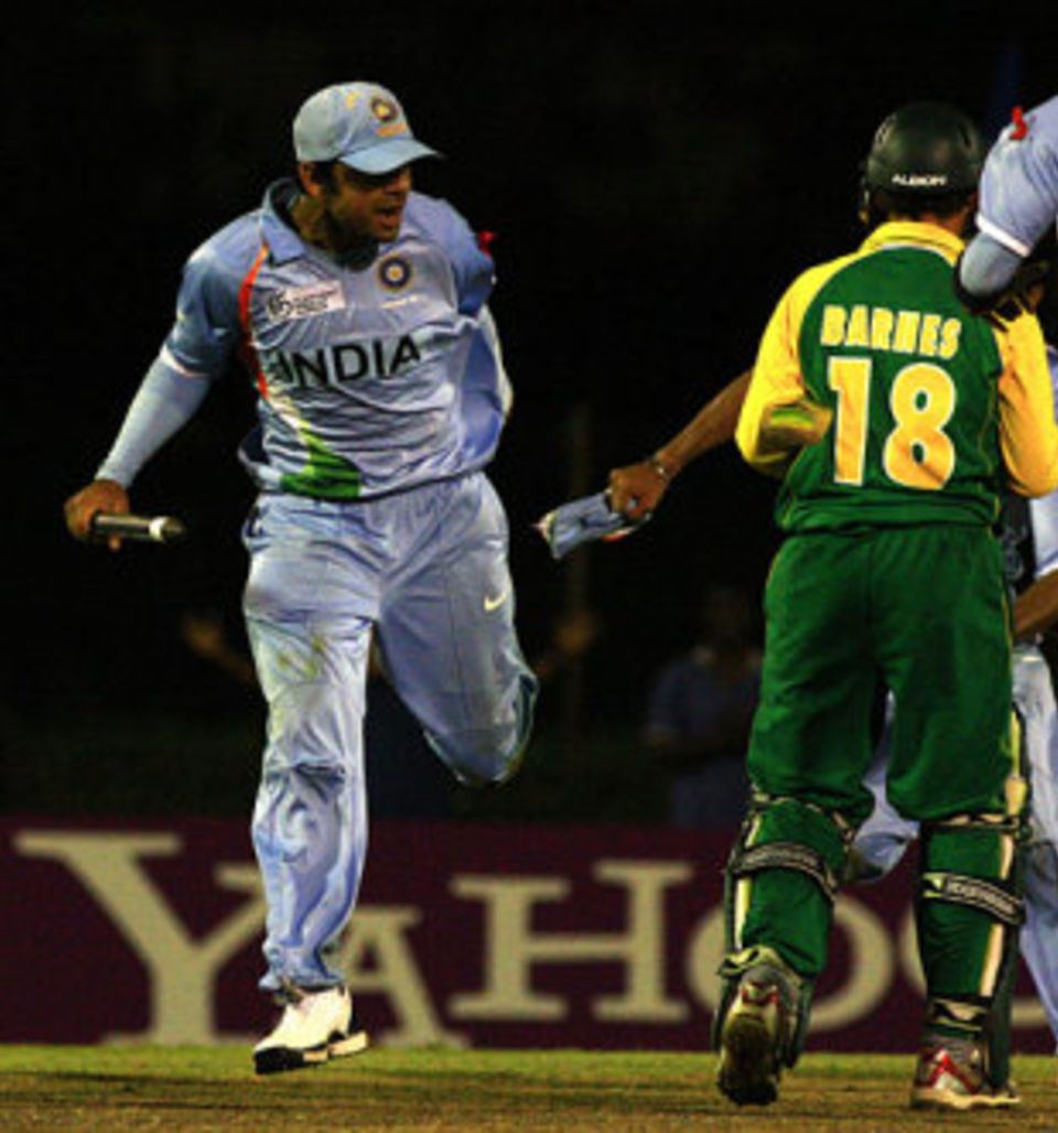 Serious as a heart attack: Virat Kohli gives Bradley Barnes a earful during the last U-19 World Cup final