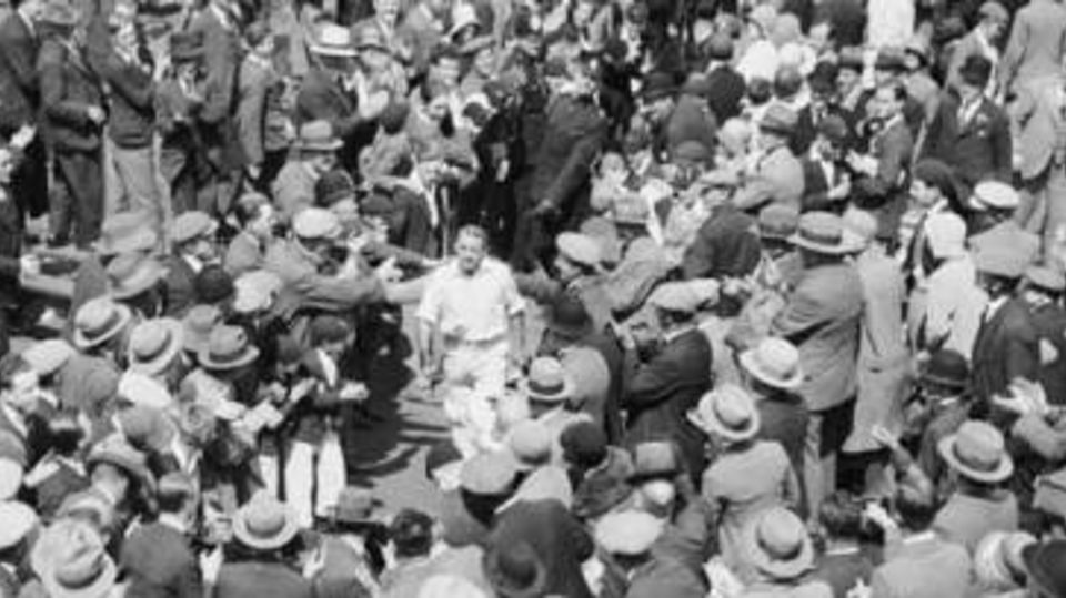 Fans surround Don Bradman