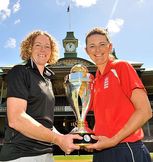 Haidee Tiffen and Charlotte Edwards with the World Cup trophy