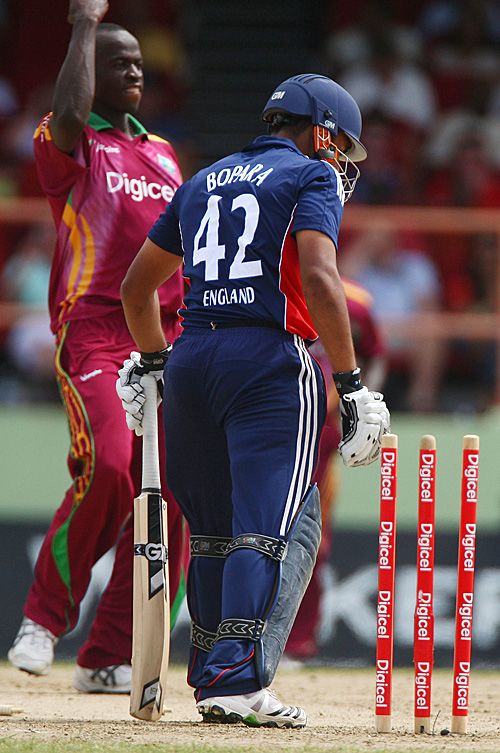Ravi Bopara is bowled by Lionel Baker
