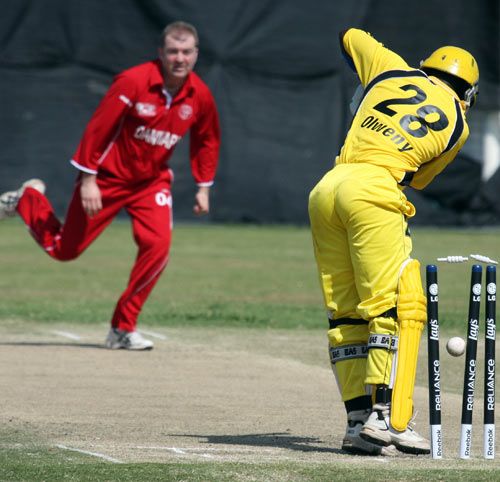 Uganda's Joel Olwenyi is bowled by Morten Hedegaard