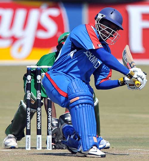 Steven Outerbridge prepares to swing the ball away