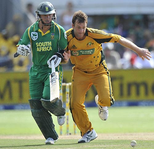 Shane Harwood rushes to the ball