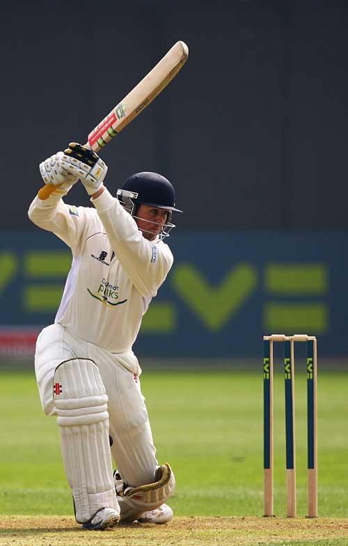 Dan Redfern drives during his half century