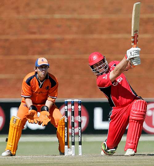 Canada's Ian Billcliff gives it some stick