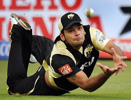 Yashpal Singh tries to pull off a catch just inches off the turf