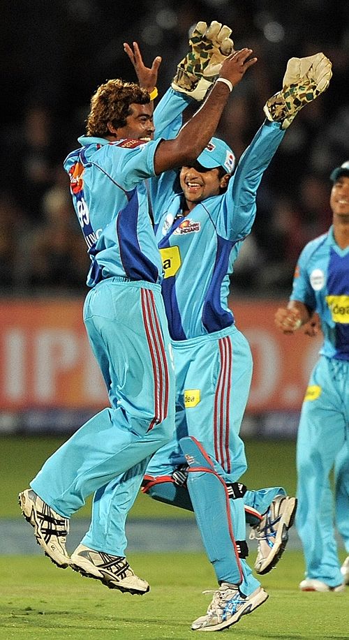 Lasith Malinga and Pinal Shah celebrate the dismissal of Brendon McCullum