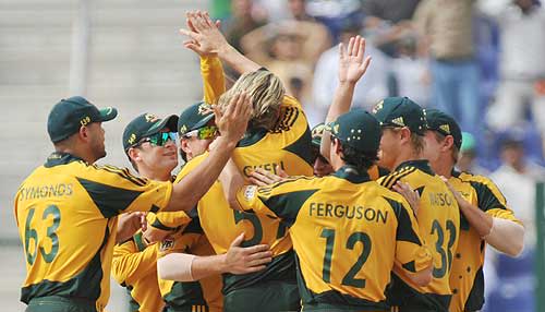 High fives all around after Nathan Bracken strikes