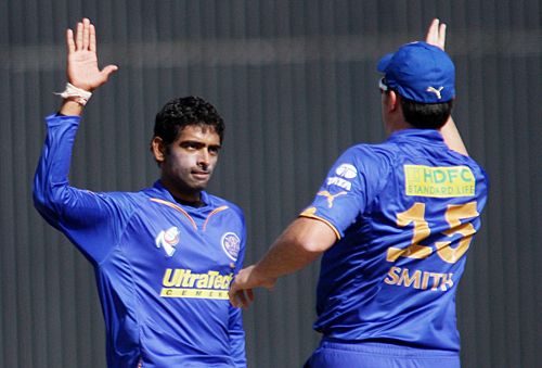 Amit Singh high-fives Graeme Smith after getting rid of Wasim Jaffer