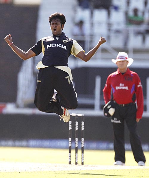 Sourav Sarkar exults after dismissing Ravindra Jadeja