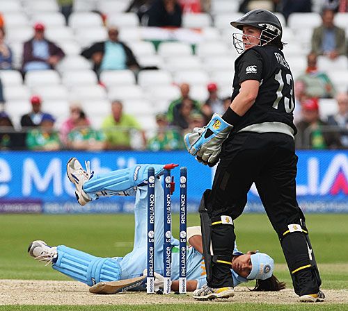 Amita Sharma knocks her stumps in trying to evade a high full toss