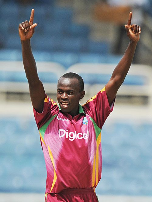 Lionel Baker is delighted after dismissing Rohit Sharma,