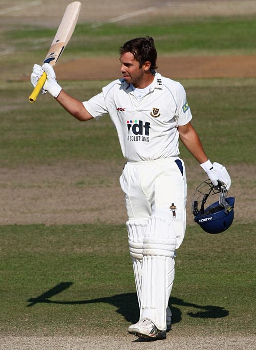 Carl Hopkinson celebrates his century