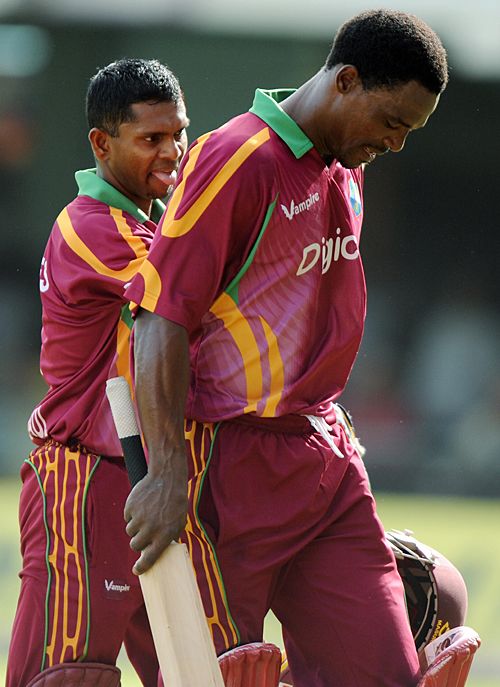 Runako Morton and Shivnarine Chanderpaul head back to the pavilion after taking West Indies through