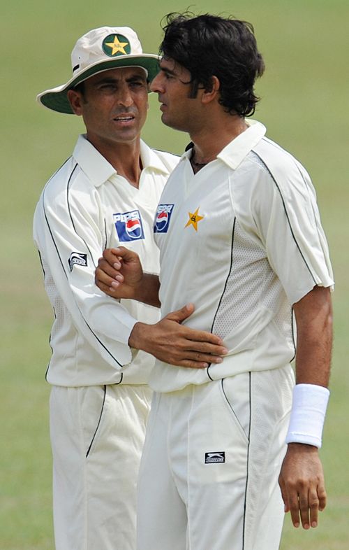 Younis Khan congratulates Abdur Rauf on picking up a wicket