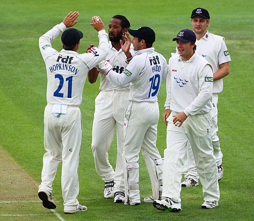 Corey Collymore celebrates a wicket