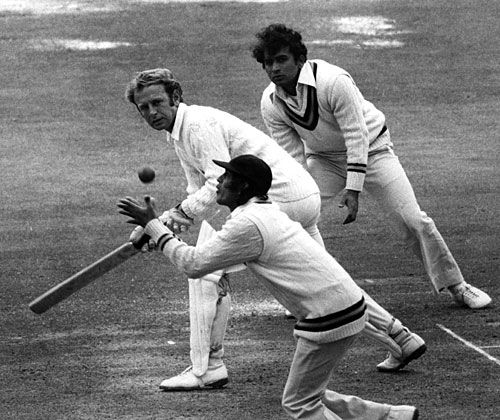 Eknath Solkar takes a catch off Derek Underwood as Sunil Gavaskar watches from silly point